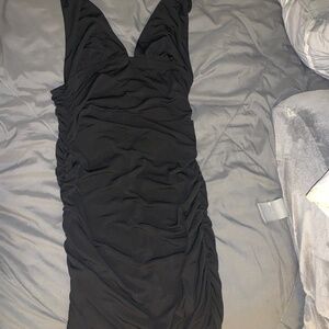 Black halter fitted side ruching mini dress sz L